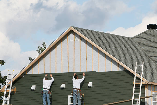 Professional Siding Contractor technician working in Ashland, VA